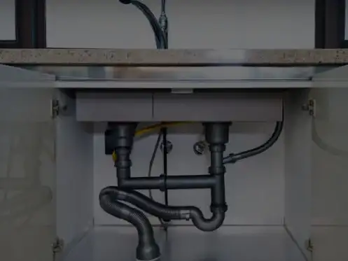 Pipes under kitchen sink